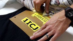 Linked Stencil On Back Of Shirt